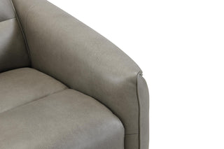 Close-up of a beige sofa with a white background