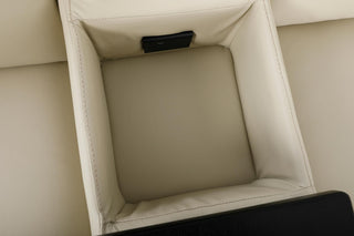 Close-up of a beige sofas middle console