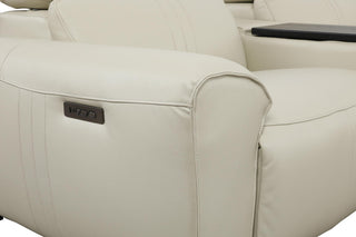 Beige recliner sofa with power control panel on armrest