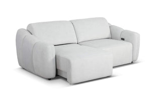 Gray sofa with one side slid out on a white background
