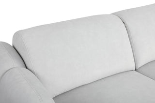 Gray sofa with a focus on the cushions and backrest.