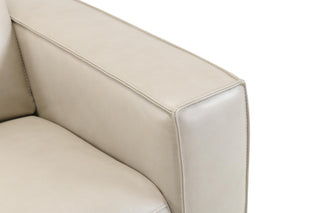 Beige leather sofa corner on a white background