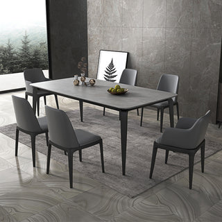 grey sintered stone dining table with grey dining chairs