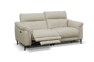 Beige sofa with reclining feature on a white background