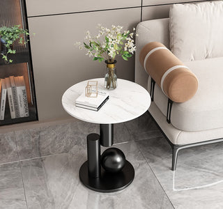 round sintered stone nell side table