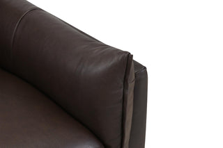 Brown leather sofa corner detail view