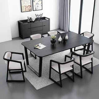 black solid wood dining table with 6 chairs