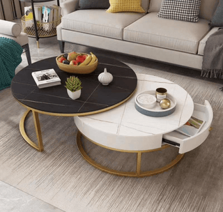 white black round split level coffee table