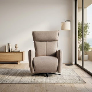 Beige recliner chair in a modern living room setting with a lamp and decor items.