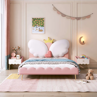 Children's bedroom with a pink bed featuring cloud and heart design, teddy bear, and toys.