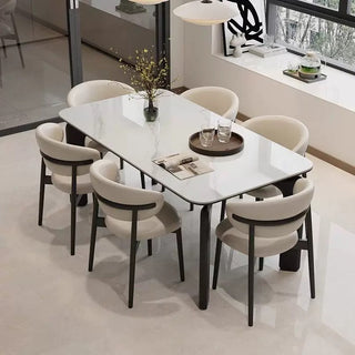 Dining table set with chairs in a modern setting