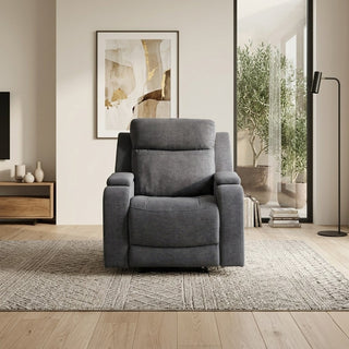 Gray recliner chair in a modern living room with abstract art and plants.