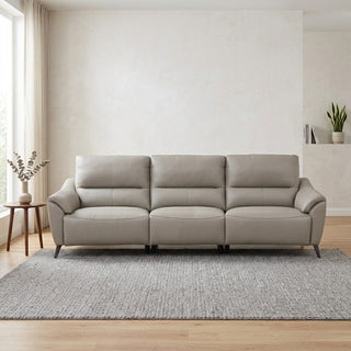 Grey 4 seater recliner sofa in a living room with a neutral color scheme