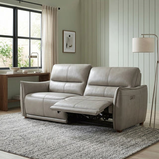 Grey sofa with reclining feature in a living room setting