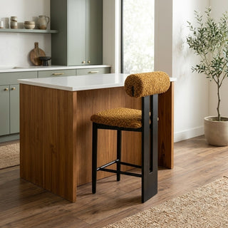 Kitchen island with bar stools in a modern kitchen setting