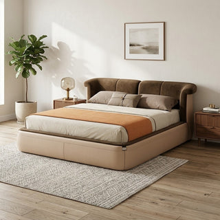 Modern bedroom with a large queensize bed, nightstands, and decor elements.
