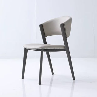 Modern dining chair with white seat and backrest on a white background