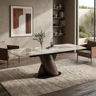 Modern dining room with a extending dining tables to seat 12, abstract art on the wall, and a bookshelf.
