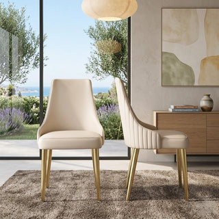 Modern dining room with beige dining chairs, a wooden sideboard, and abstract art on the wall.