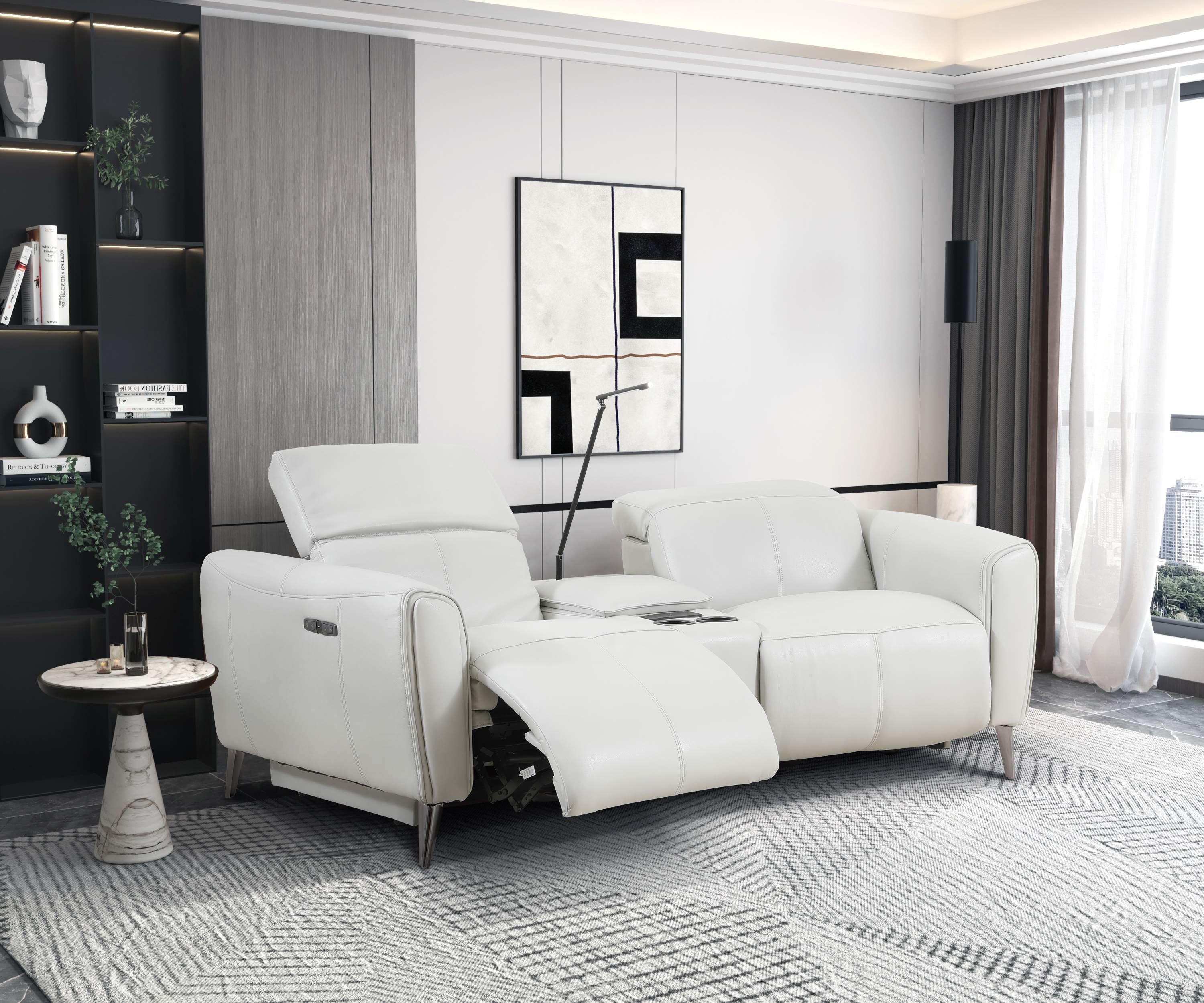 Modern electric recliner sofa in white color with side buttons and built-in USB ports, positioned in a room with a minimalist design aesthetic.