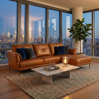 Modern living room with a brown leather sofa, coffee table, and city skyline view.