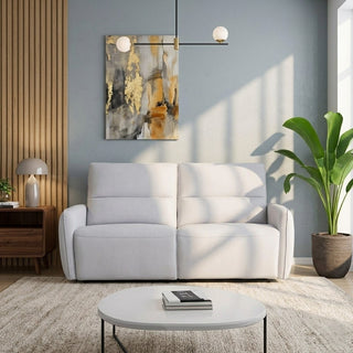 Modern living room with a recliner sofa fabric, round coffee table, and abstract art on the wall.