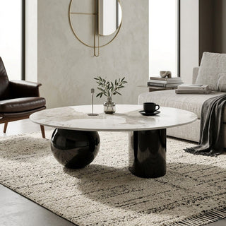 Modern living room with a stone coffee table and stylish decor.