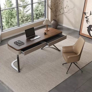 Modern office desk with a chair in a room with large windows and decorative elements.