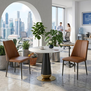 Modern office space with round discussion table and chairs, cityscape view