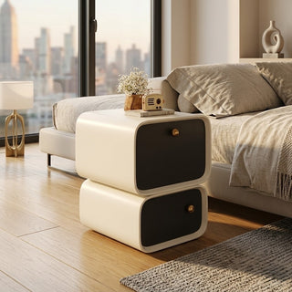 Modern small bedside table with black and white design in a living room setting