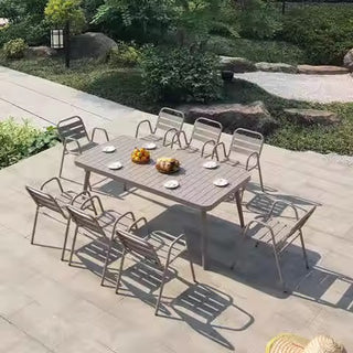 Outdoor patio set with a table and chairs on a patio