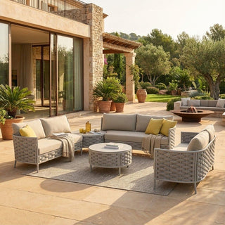 Outdoor patio with modern furniture set and potted plants