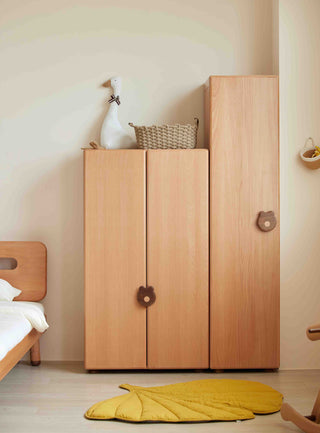 Wooden Childrens wardrobe with a bed and yellow rug in a room