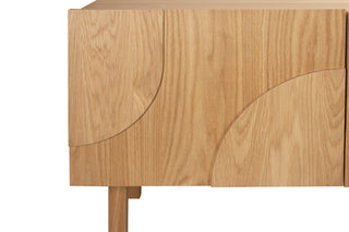Wooden cabinet with curved design on a white background