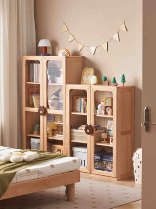 Wooden children's bookshelf with toys and books in a room setting.