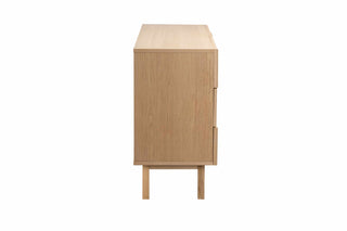 Wooden sideboard with a single door and two drawers on a white background