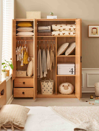 Wooden wardrobe with clothes and accessories in a bedroom setting