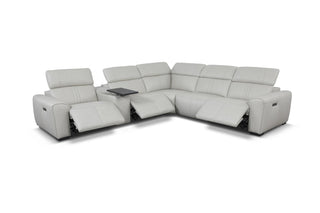 Gray sectional sofa with reclining seats on a white background
