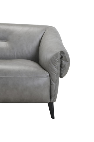 Gray sofa with a tufted backrest on a white background