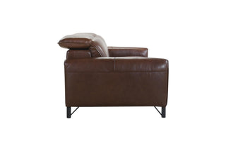 Brown leather sofa with cushions on a white background