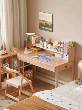 kids Wooden desk with chair in a room with books and decor