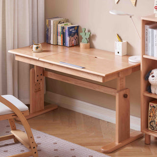 kids study desk with chair, books, and decorative items in a room setting.