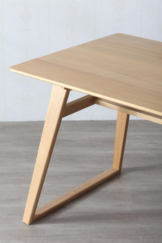 manta wood table perfect for intimate gatherings