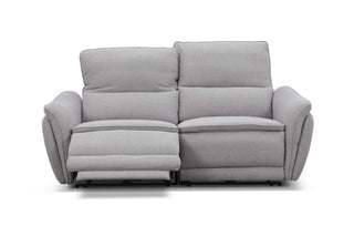 Gray sofa with reclining feature on a white background