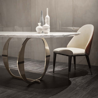 gold legs marble dining table with contrasting design chair