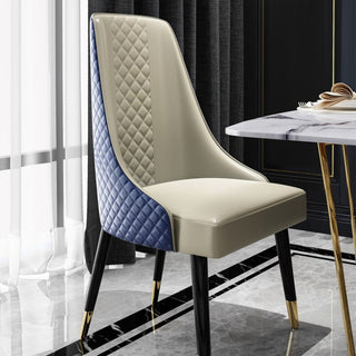 blue quilted dining chair with gold tip leg