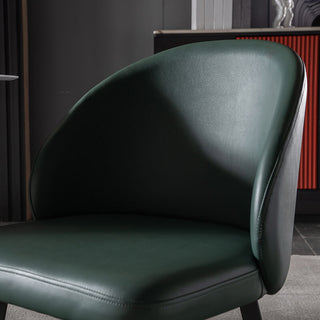 green pu leather dining chair close up