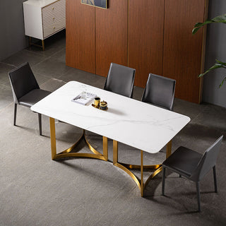 modern chic sintered stone table with black leather chairs