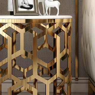 white marble side table gold stainless steel close up